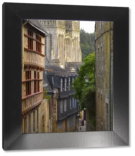 France, Brittany, Finistere, Quimper, view down cobbled street to Saint Corentin cathedral