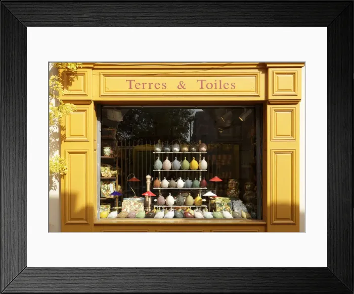 Framed Print : France, Provence, Bouches-du-Rhone, Arles, front of a brightly coloured facade of a shop