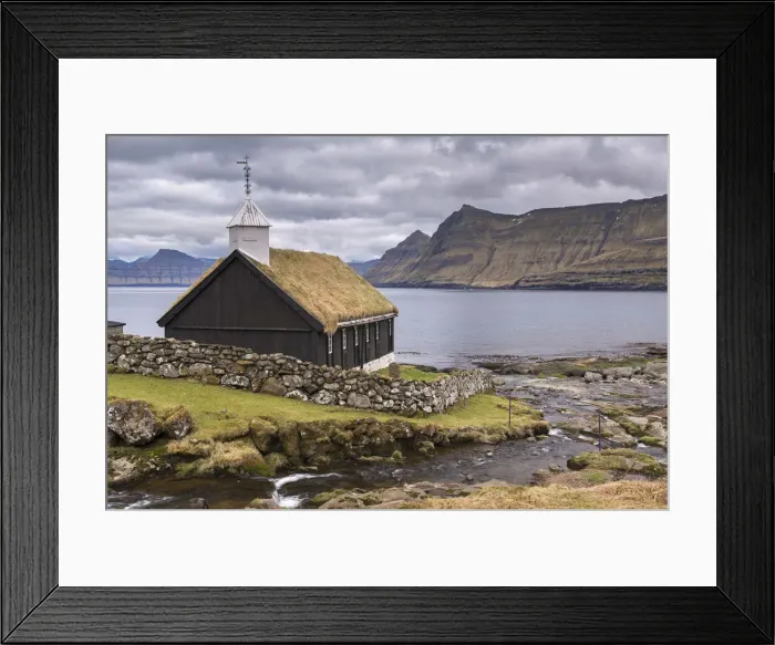 Framed Print : Traditional grass roofed Faroese church in the village of Funningur on the island Framed Print : Traditional grass roofed Faroese church in the village of Funningur on the island