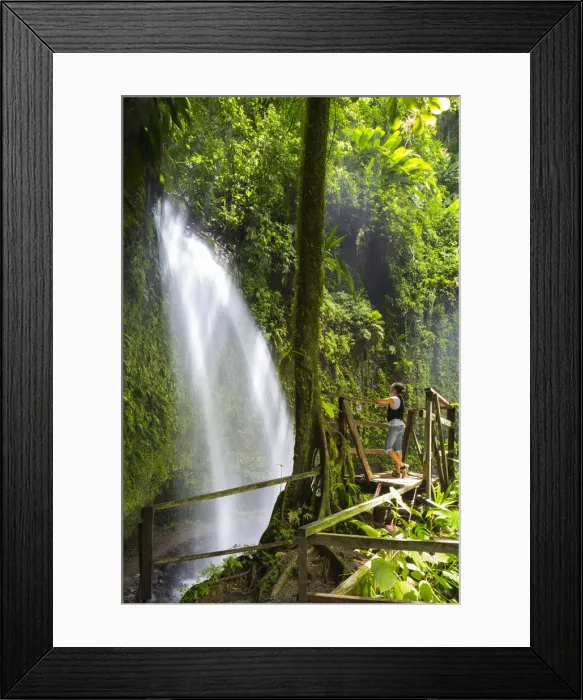 Framed Print : Dominica, Pont Casse. A tourst admires Soulton Falls. (MR) Framed Print : Dominica, Pont Casse. A tourst admires Soulton Falls. (MR)
