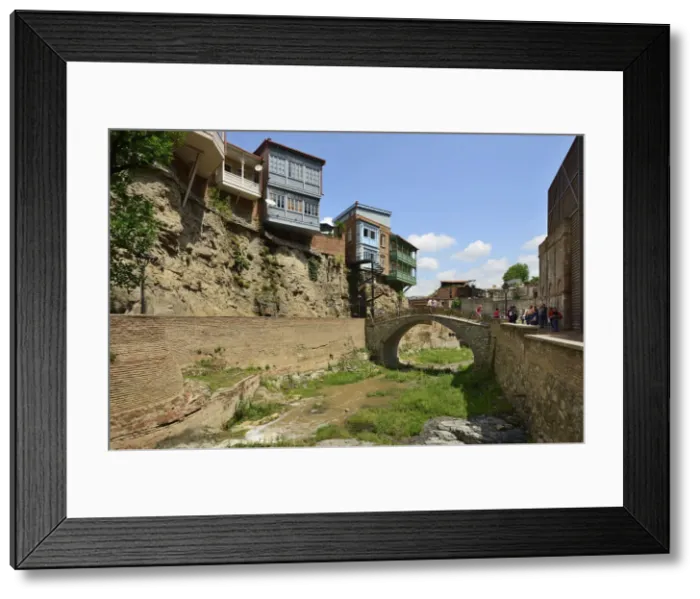 Framed Print : Traditional houses on a cliff. Dzveli Sulphur Waterfall. Tbilisi, Georgia. Caucasus Framed Print : Traditional houses on a cliff. Dzveli Sulphur Waterfall. Tbilisi, Georgia. Caucasus