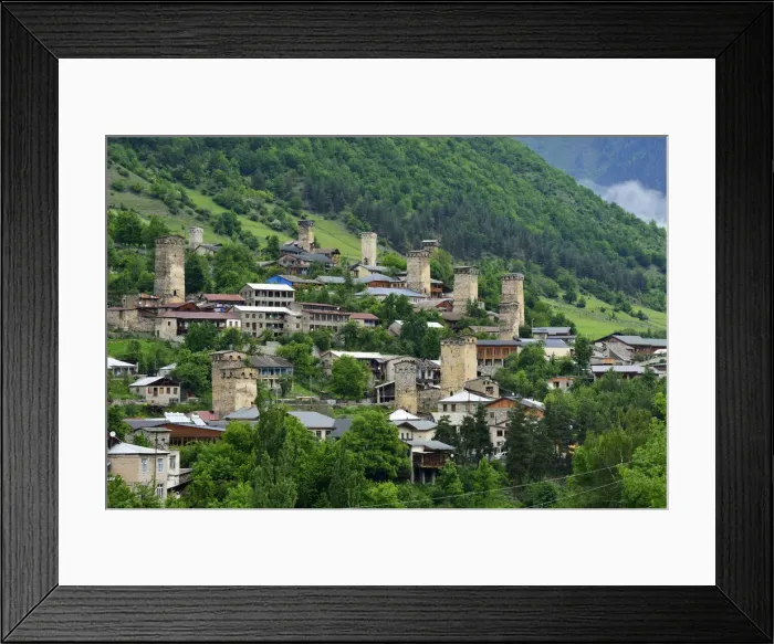 Framed Print : Medieval defensive towers at the mountain village of Mestia. A UNESCO World Heritage Site Framed Print : Medieval defensive towers at the mountain village of Mestia. A UNESCO World Heritage Site