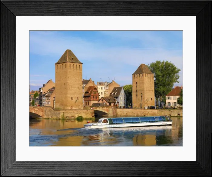 Framed Print : France, Alsace, Strasbourg, Pont couverts, Tourist boat Framed Print : France, Alsace, Strasbourg, Pont couverts, Tourist boat
