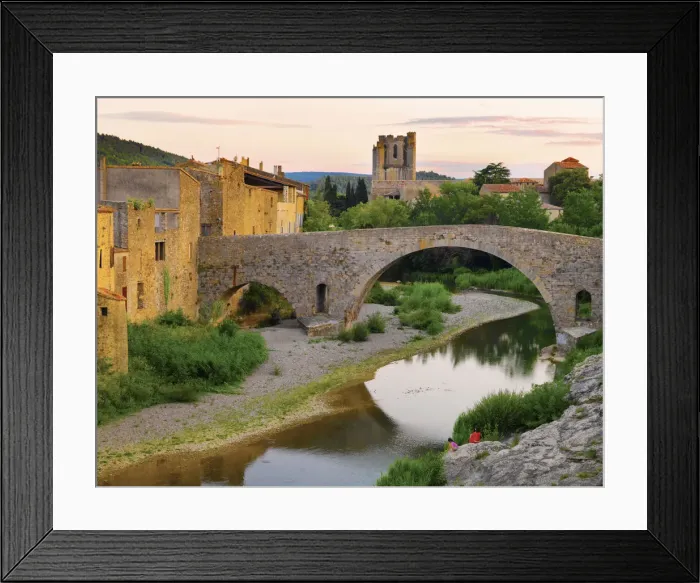 Framed Print : France, Languedoc, Lagrasse, woman and girl siiting by river (MR) Framed Print : France, Languedoc, Lagrasse, woman and girl siiting by river (MR)