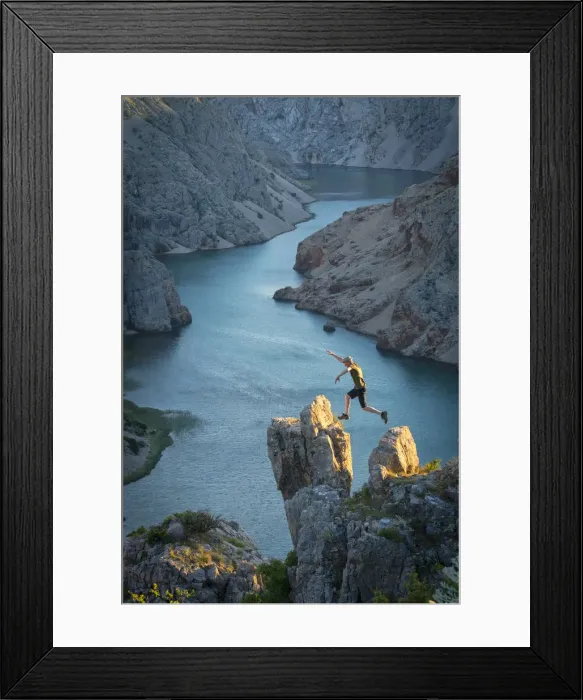 Framed Print : Europe, Balkan, Croatia, man with hat jumping at Zrmanja canyon Framed Print : Europe, Balkan, Croatia, man with hat jumping at Zrmanja canyon