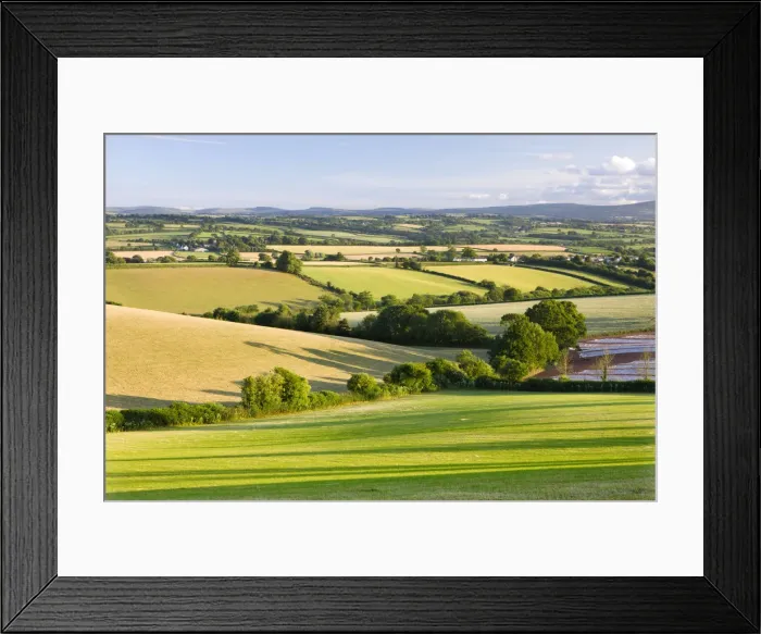 Framed Print : Rolling countryside near the village of Bow, looking south towards the hills of Dartmoor Framed Print : Rolling countryside near the village of Bow, looking south towards the hills of Dartmoor