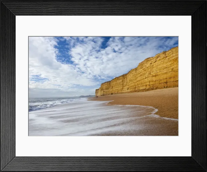 Framed Print : Waves wash clean Hive Beach backed by towering sandstone cliffs, Burton Bradstock Framed Print : Waves wash clean Hive Beach backed by towering sandstone cliffs, Burton Bradstock