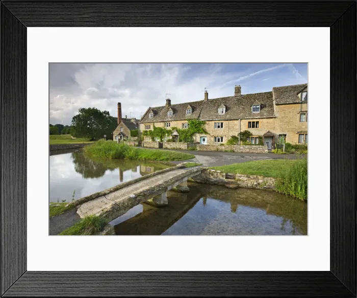 Framed Print : Stone footbridge and cottages at Lower Slaughter in the Cotswolds, Gloucestershire Framed Print : Stone footbridge and cottages at Lower Slaughter in the Cotswolds, Gloucestershire