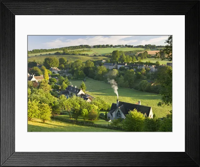 Framed Print : Cottages nestled into the valley in the picturesque Cotswolds village of Naunton Framed Print : Cottages nestled into the valley in the picturesque Cotswolds village of Naunton