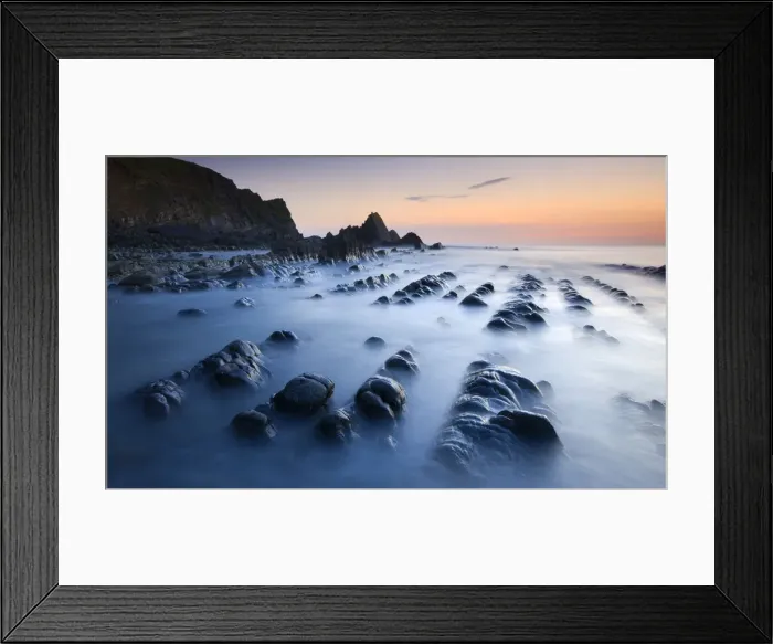 Framed Print : High tide gradually submerges the rocky shores of Blegberry Bay at sunset, Hartland Framed Print : High tide gradually submerges the rocky shores of Blegberry Bay at sunset, Hartland