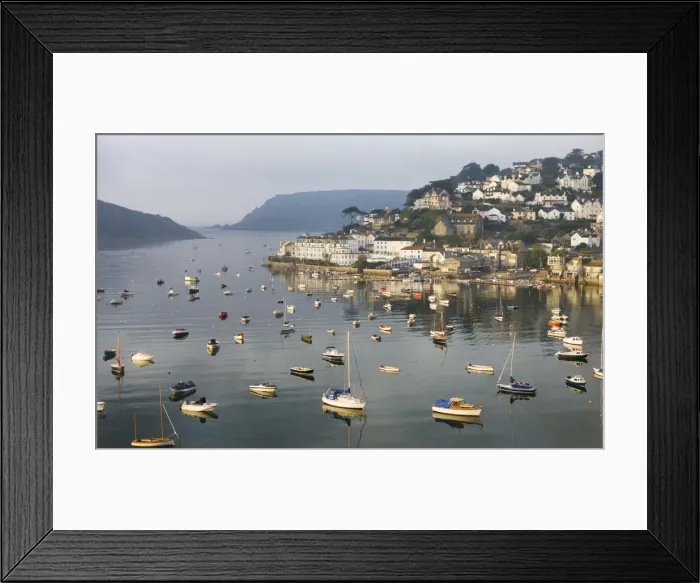 Framed Print : Early morning sunlight on Salcombe and the yachts in Kingsbridge Estuary, South Hams Framed Print : Early morning sunlight on Salcombe and the yachts in Kingsbridge Estuary, South Hams