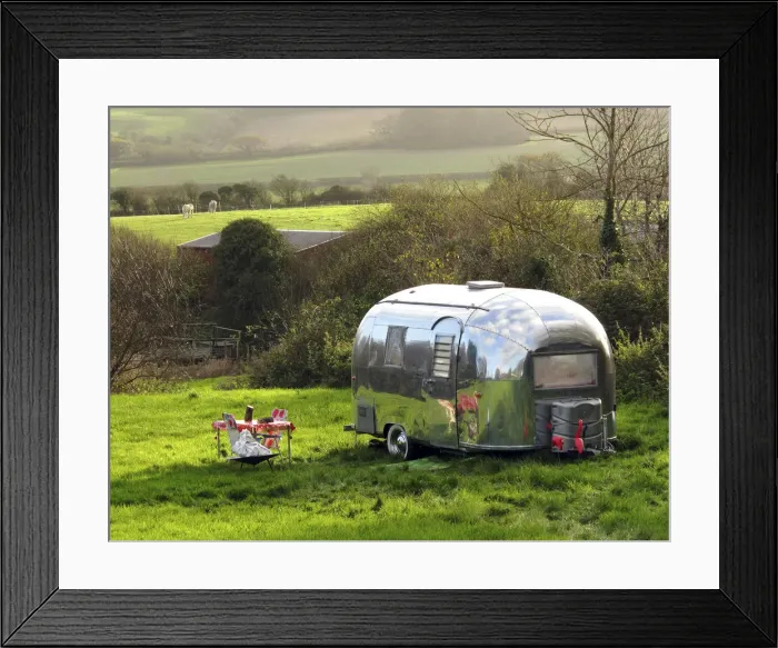 Framed Print : Shiny Airstream caravan parked near Lulworth Cove, Dorset, UK Framed Print : Shiny Airstream caravan parked near Lulworth Cove, Dorset, UK