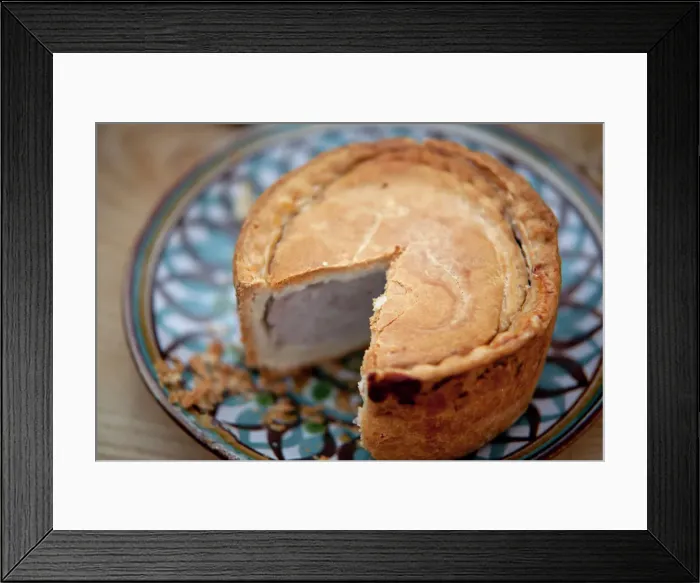 Framed Print : Nottinghamshire, UK. Melton Mowbray pork pie on handmade ceramic plate Framed Print : Nottinghamshire, UK. Melton Mowbray pork pie on handmade ceramic plate