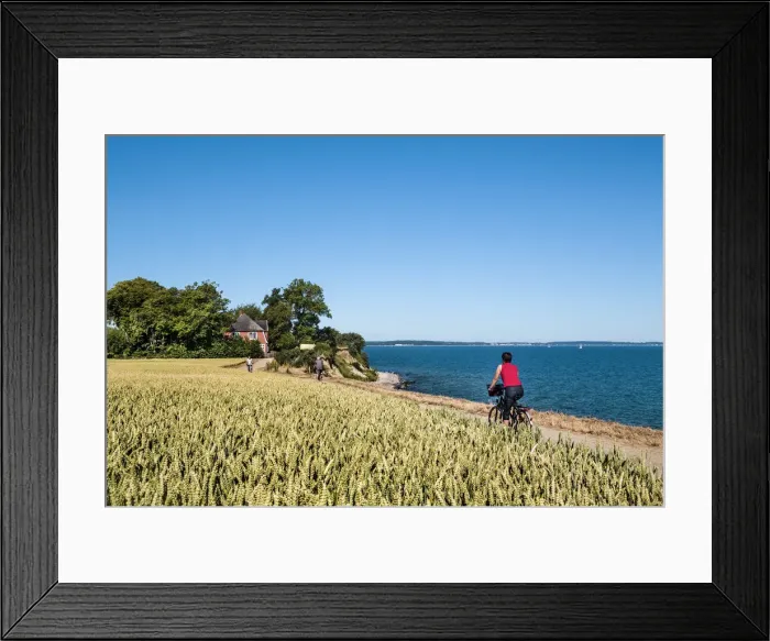 Framed Print : Cyclists at cliff Brodtener Ufer, Niendorf, Baltic coast, Schleswig-Holstein, Germany Framed Print : Cyclists at cliff Brodtener Ufer, Niendorf, Baltic coast, Schleswig-Holstein, Germany