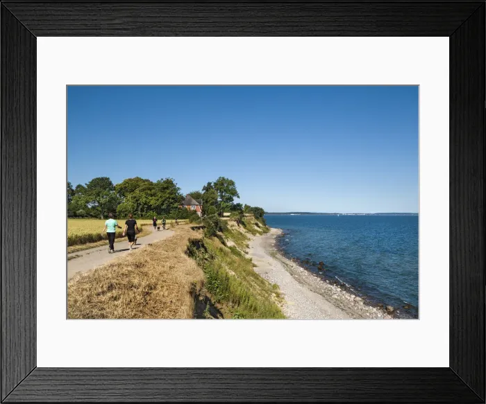 Framed Print : Hiker at cliff Brodtener Ufer, Niendorf, Baltic coast, Schleswig-Holstein, Germany Framed Print : Hiker at cliff Brodtener Ufer, Niendorf, Baltic coast, Schleswig-Holstein, Germany