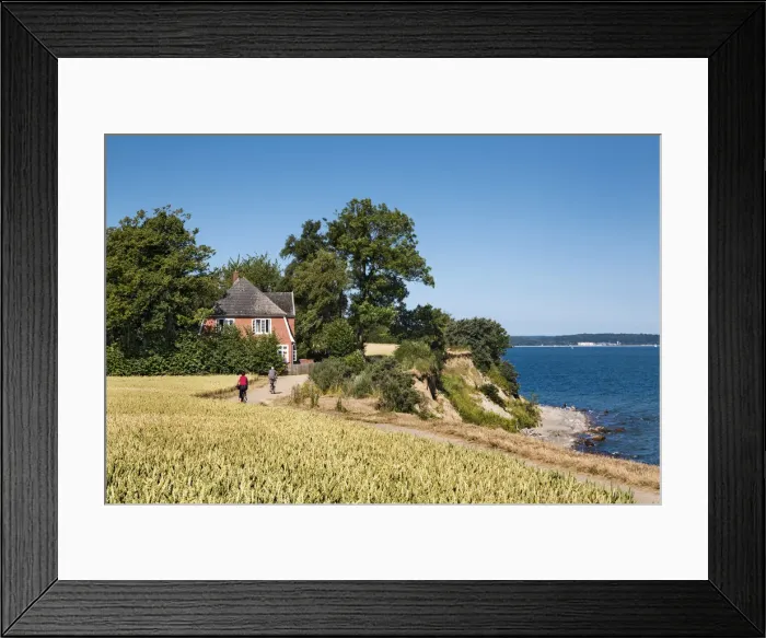 Framed Print : Cyclists at cliff Brodtener Ufer, Niendorf, Baltic coast, Schleswig-Holstein, Germany Framed Print : Cyclists at cliff Brodtener Ufer, Niendorf, Baltic coast, Schleswig-Holstein, Germany