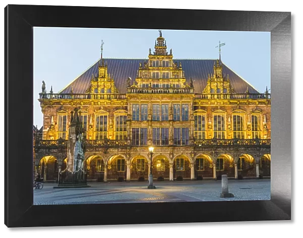 Bremen, Bremen State, Germany. Roland statue and the City Hall (Rathaus) illuminated