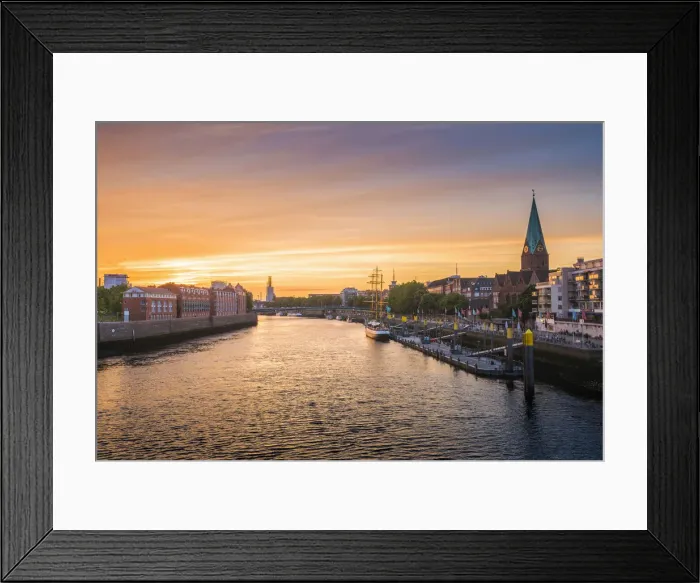 Framed Print : Bremen, Bremen State, Germany. Cityscape at sunset over the Weser river