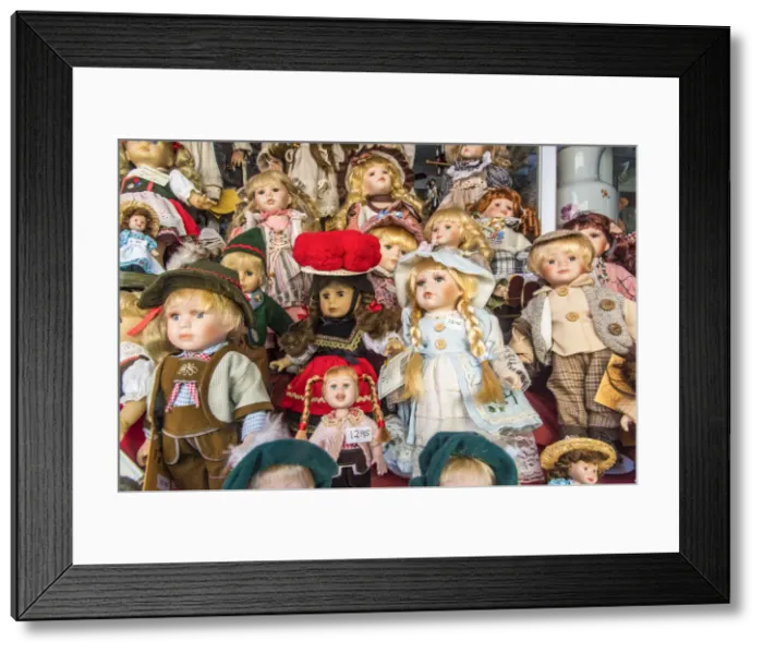 Framed Print : Porcelain dolls on display in a shop window, Rothenburg ob der Tauber, Bavaria, Germany Framed Print : Porcelain dolls on display in a shop window, Rothenburg ob der Tauber, Bavaria, Germany