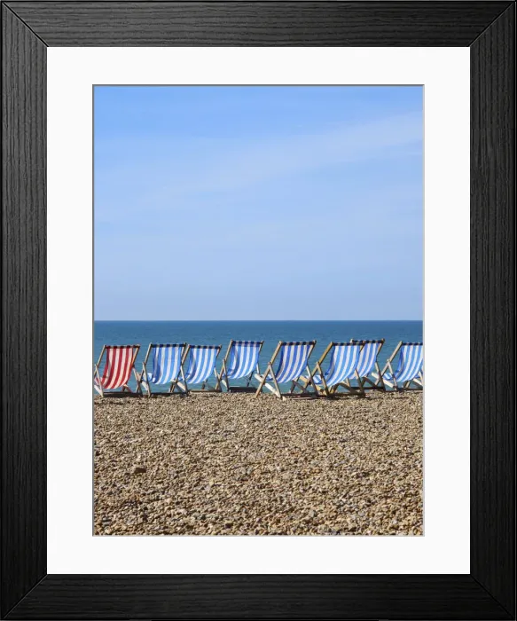 Framed Print : Deck chairs on Brighton beach, Brighton, Sussex, UK Framed Print : Deck chairs on Brighton beach, Brighton, Sussex, UK