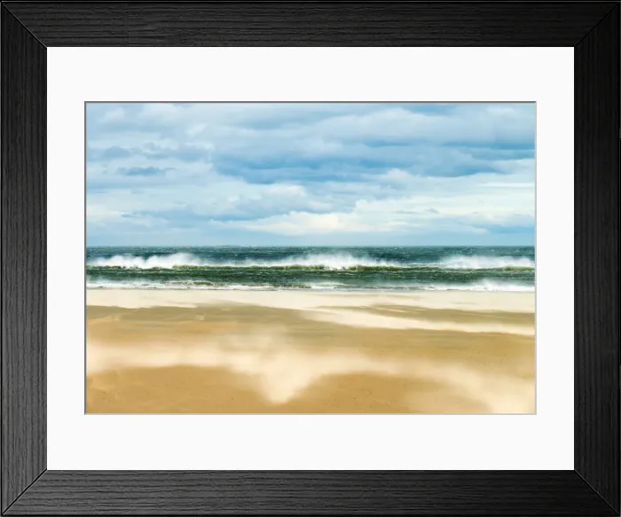 Framed Print : Windy day on the sandy beach between Bamburgh and Seahouses, Northumberland, UK