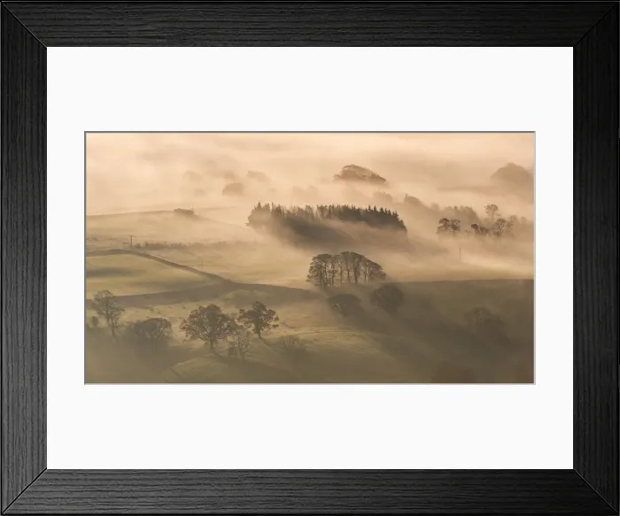 Framed Print : Mist covered rolling countryside at dawn, Lake District, Cumbria, England. Autumn