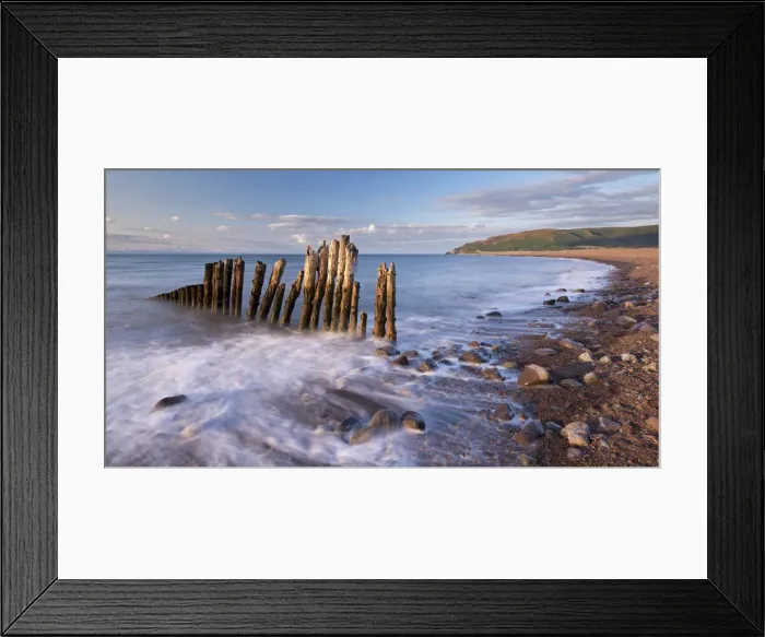 Framed Print : Wooden sea defences at Porlock Bay in Exmoor National Park, Somerset, England. Summer