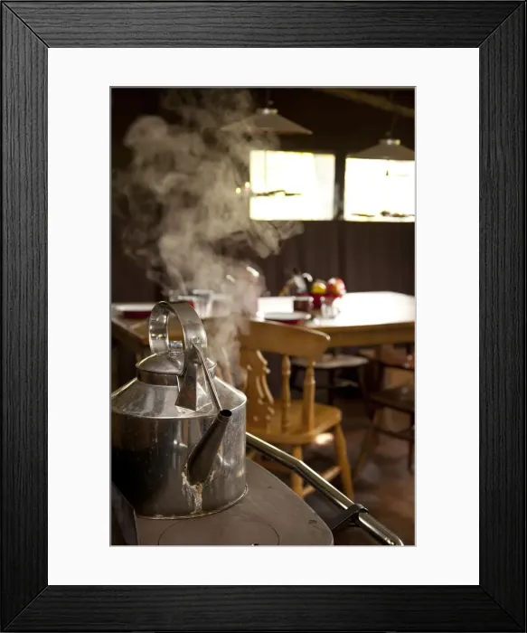 Framed Print : Bedfordshire, England. The kettle boils in a glamping holiday tent Framed Print : Bedfordshire, England. The kettle boils in a glamping holiday tent