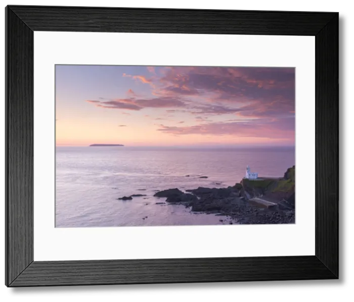Framed Print : Hartland Point Lighthouse and Lundy Island beneath a colourful sunset, North Devon Framed Print : Hartland Point Lighthouse and Lundy Island beneath a colourful sunset, North Devon