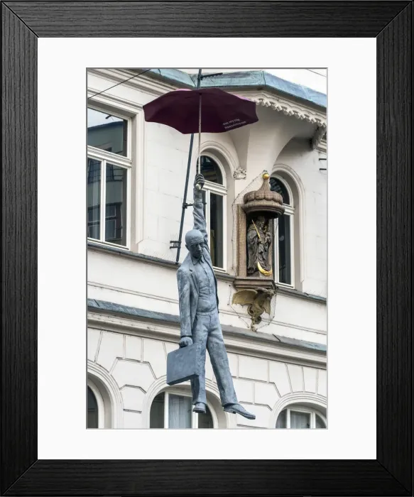Framed Print : Suspended man with umbrella street sculpture, Prague, Bohemia, Czech Republic Framed Print : Suspended man with umbrella street sculpture, Prague, Bohemia, Czech Republic