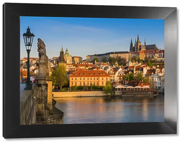 Morning view of Mala Strana district and St. Vitus cathedral from Charles Bridge, Prague