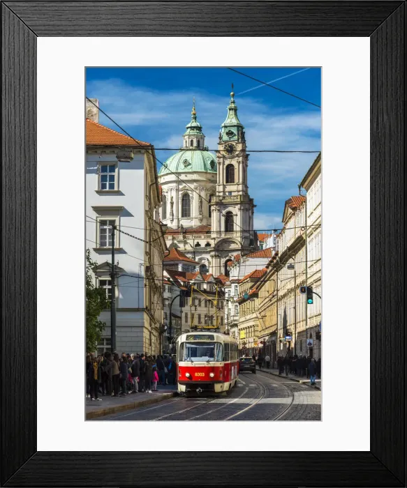 Framed Print : Street in Mala Strana district with tram and St. Nicholas Church in the background Framed Print : Street in Mala Strana district with tram and St. Nicholas Church in the background
