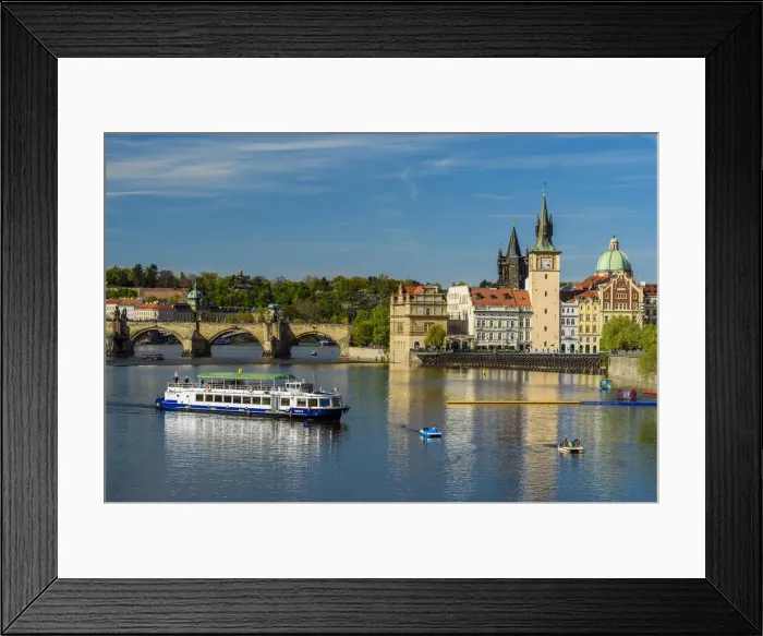 Framed Print : River cruise boat on Vltava River with Smetana Museum and Charles Bridge in the background Framed Print : River cruise boat on Vltava River with Smetana Museum and Charles Bridge in the background
