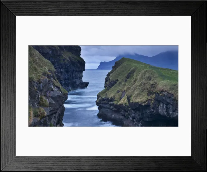 Framed Print : Dramatic coastline at Gjogv on the island of Eysturoy, Faroe Islands. Spring Framed Print : Dramatic coastline at Gjogv on the island of Eysturoy, Faroe Islands. Spring