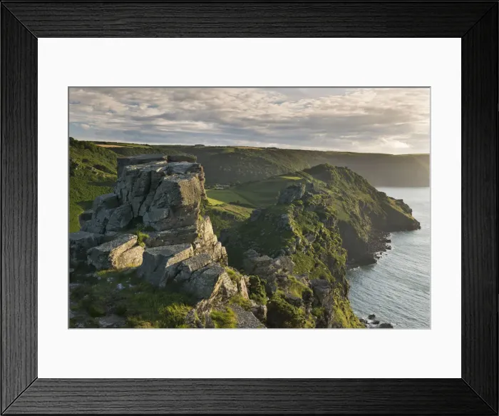 Framed Print : Towering cliffs at Valley of Rocks, Exmoor, Devon, England. Summer (July) Framed Print : Towering cliffs at Valley of Rocks, Exmoor, Devon, England. Summer (July)