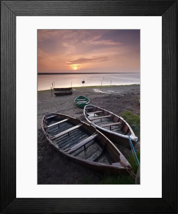 Framed Print : Boats at low tide on the shore of The Fleet lagoon, Chesil Beach, Dorset, England. Spring Framed Print : Boats at low tide on the shore of The Fleet lagoon, Chesil Beach, Dorset, England. Spring