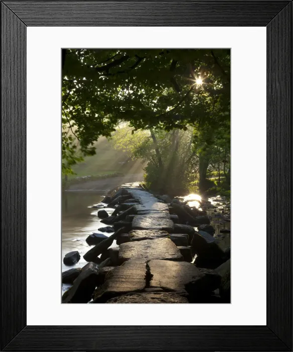 Framed Print : Early morning sunlight shining onto Tarr Steps ancient clapper bridge, Exmoor National Framed Print : Early morning sunlight shining onto Tarr Steps ancient clapper bridge, Exmoor National