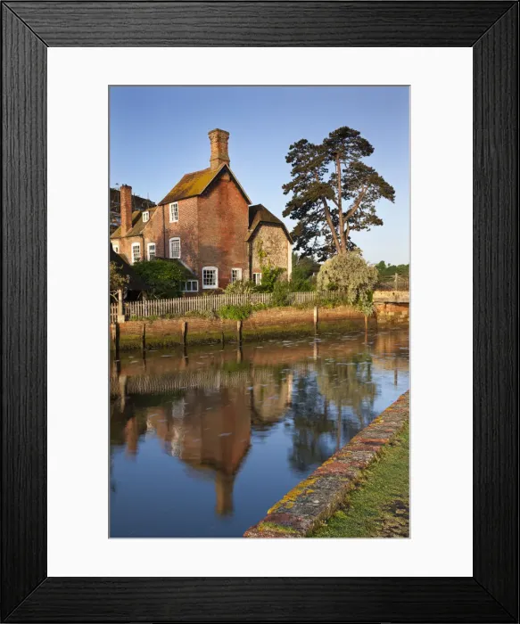 Framed Print : The 16th Century Mill House beside Beaulieu River, New Forest, Hampshire, England. Spring Framed Print : The 16th Century Mill House beside Beaulieu River, New Forest, Hampshire, England. Spring