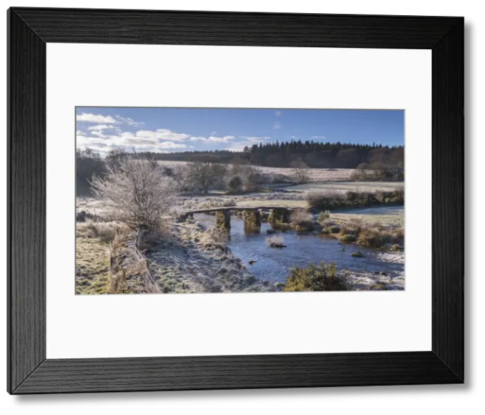 Framed Print : Frosty winter conditions at the old clapper bridge at Postbridge, Dartmoor, Devon Framed Print : Frosty winter conditions at the old clapper bridge at Postbridge, Dartmoor, Devon