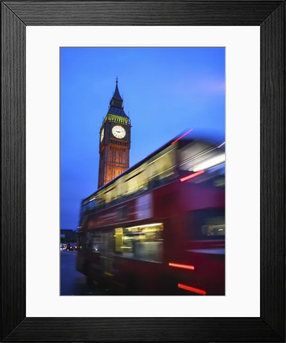 Framed Print : London, UK, Double Decker red bus passing in front of the Big Ben illuminated at dusk Framed Print : London, UK, Double Decker red bus passing in front of the Big Ben illuminated at dusk