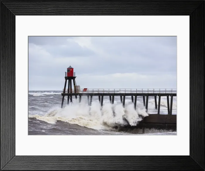 Framed Print : United Kingdom, England, North Yorkshire, Whitby. The East Pier during a Winter storm Framed Print : United Kingdom, England, North Yorkshire, Whitby. The East Pier during a Winter storm
