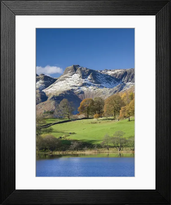 Framed Print : Snow dusted Langdale Pikes viewed from the shores of Loughrigg Tarn, Lake District Framed Print : Snow dusted Langdale Pikes viewed from the shores of Loughrigg Tarn, Lake District