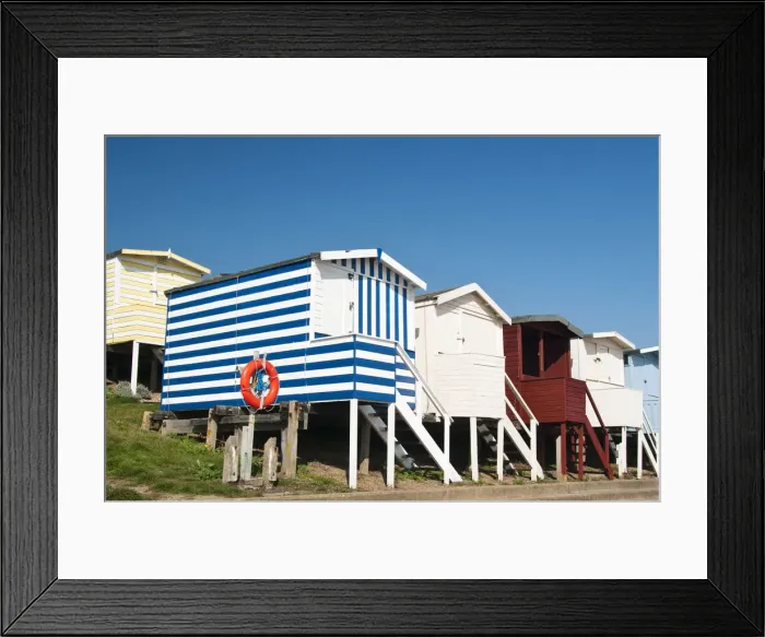 Framed Print : Traditional beach huts in Walton-on-the-Naze, Essex, UK Framed Print : Traditional beach huts in Walton-on-the-Naze, Essex, UK