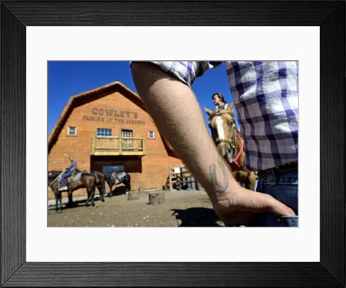 Framed Print : Cowboy provides guests with horses, Rafter Six Ranch, Exshaw, Calgary, Alberta, Canada Framed Print : Cowboy provides guests with horses, Rafter Six Ranch, Exshaw, Calgary, Alberta, Canada