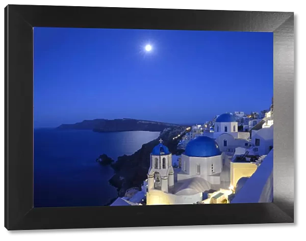 Moon over the town of Oia, Santorini, Kyclades, South Aegean, Greece, Europe