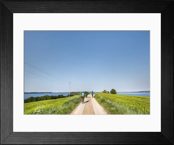 Framed Print : Cyclists, Reddevitzer Haoft, Maonchgut, RAogen Island, Mecklenburg-Western Pomerania