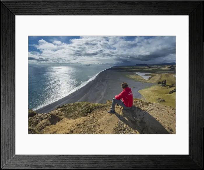 Framed Print : Vik, Southern Iceland. Man looks the horizon on top of Dyrholaey Framed Print : Vik, Southern Iceland. Man looks the horizon on top of Dyrholaey