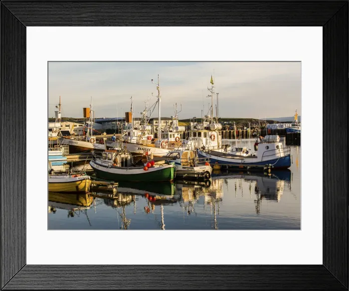 Framed Print : Husavik harbour, Iceland. boats ready for whale watching, sunset