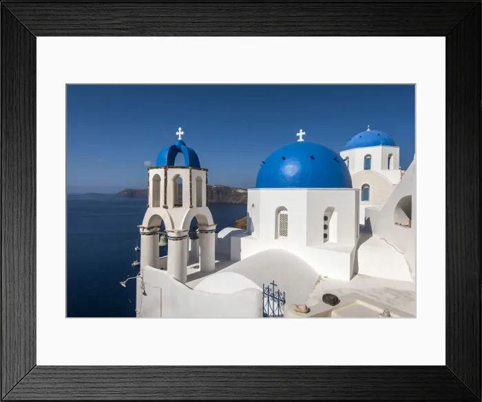Framed Print : Greek orthodox church with blue domes in Oia, Santorini, South Aegean, Greece Framed Print : Greek orthodox church with blue domes in Oia, Santorini, South Aegean, Greece