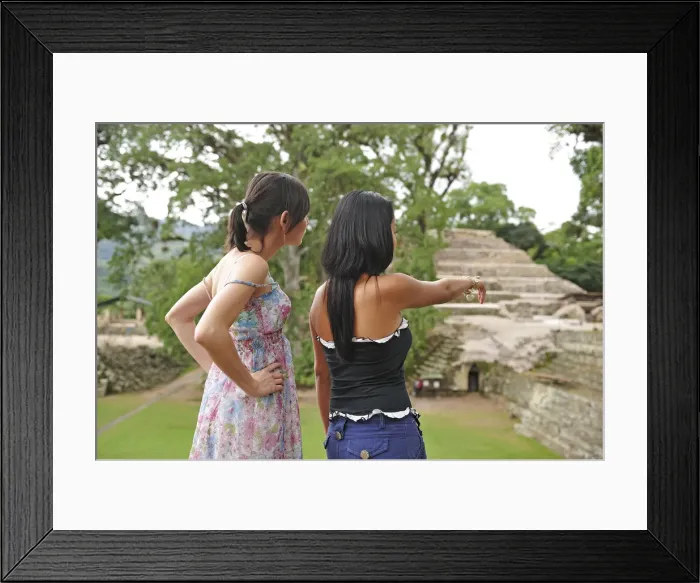 Framed Print : Two local girls exploring the Copan Ruinas, Honduras, Central America. MR Framed Print : Two local girls exploring the Copan Ruinas, Honduras, Central America. MR